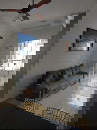 Sala com sofá cama