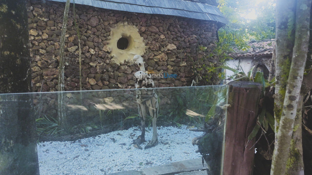Casa de pedra, ícone da vila Casa para aluguel de temporada em Serra (Praia de Capuba)