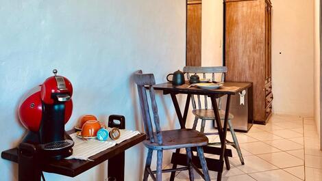 Suite with balcony overlooking the sea in Ilhabela, 900 meters from the beach and shops.