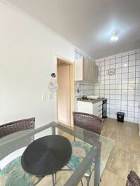 Apartment in a building with a swimming pool.