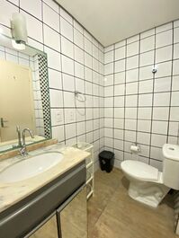 Apartment in a building with a swimming pool.