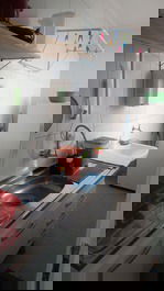 Filtro de água e lavanderia ao fundo