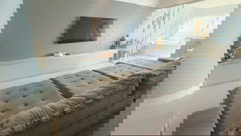 Oceanfront property with jacuzzi and charcoal grill, including 2 private parking spaces.