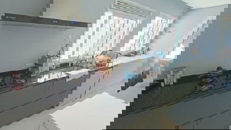 Oceanfront property with jacuzzi and charcoal grill, including 2 private parking spaces.