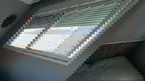 Oceanfront property with jacuzzi and charcoal grill, including 2 private parking spaces.