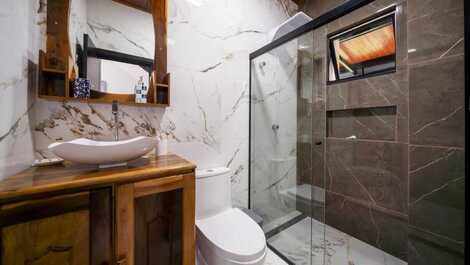 Linda casa na costeira de zimbros