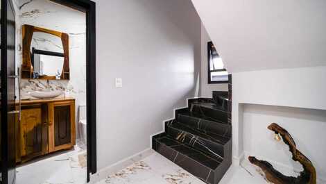 Linda casa na costeira de zimbros