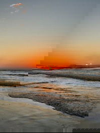 Casa de Praia no Rio Tavares: Família e Natureza