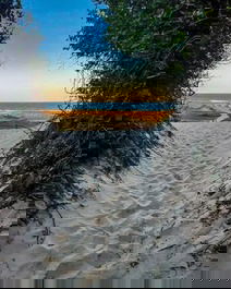 Casa de Praia no Rio Tavares: Família e Natureza